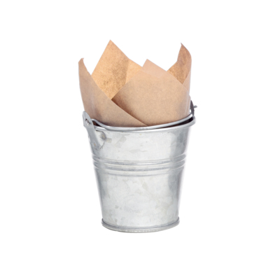 A small metal bucket with a paper liner inside
