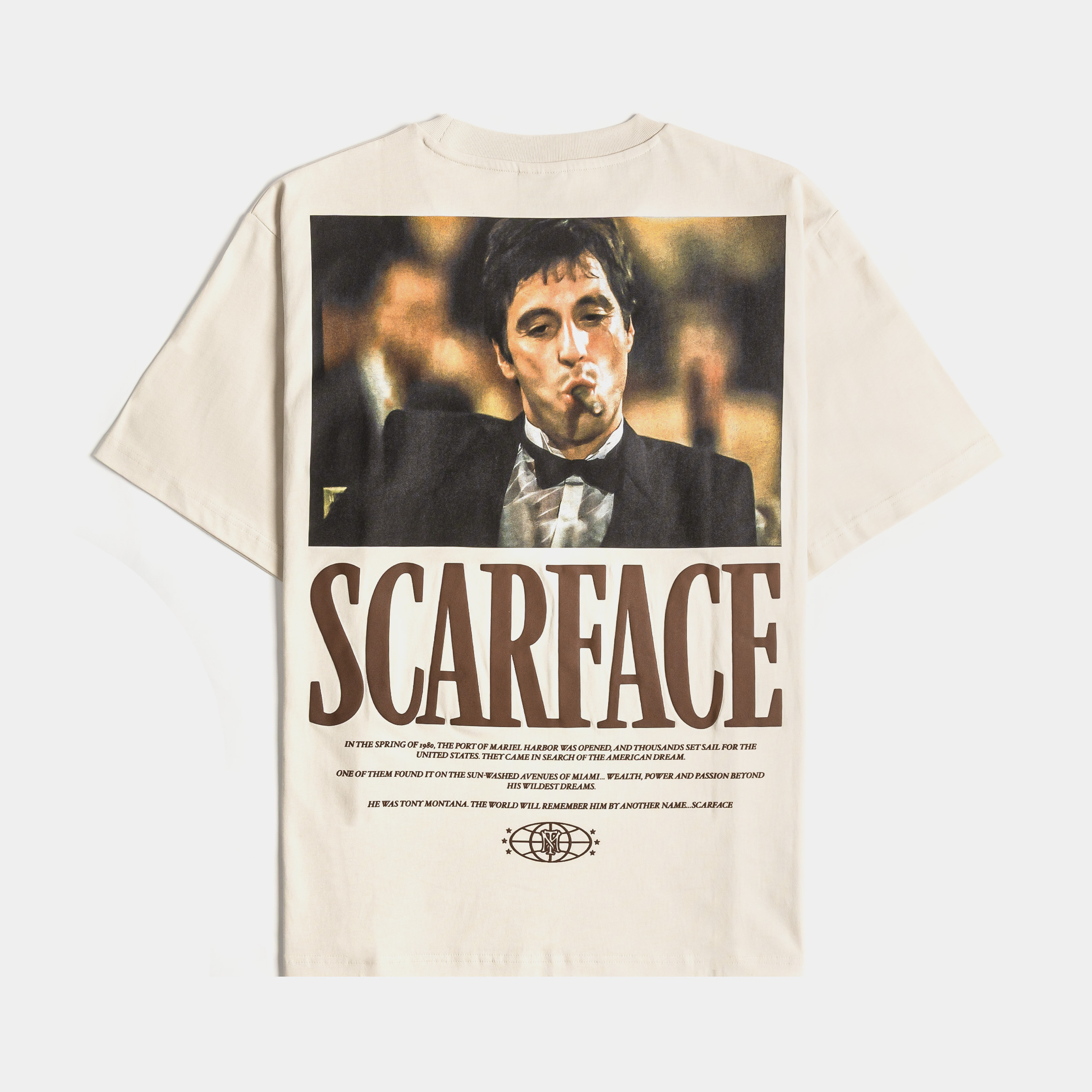 Beige t-shirt with printed designs on the front.
