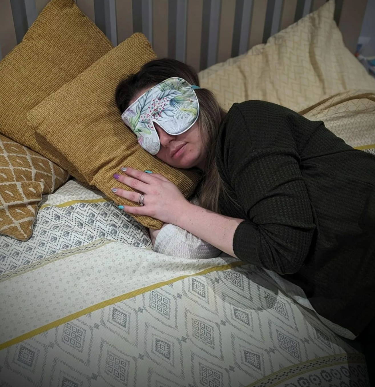 girl sleeping with a silk sleep mask 