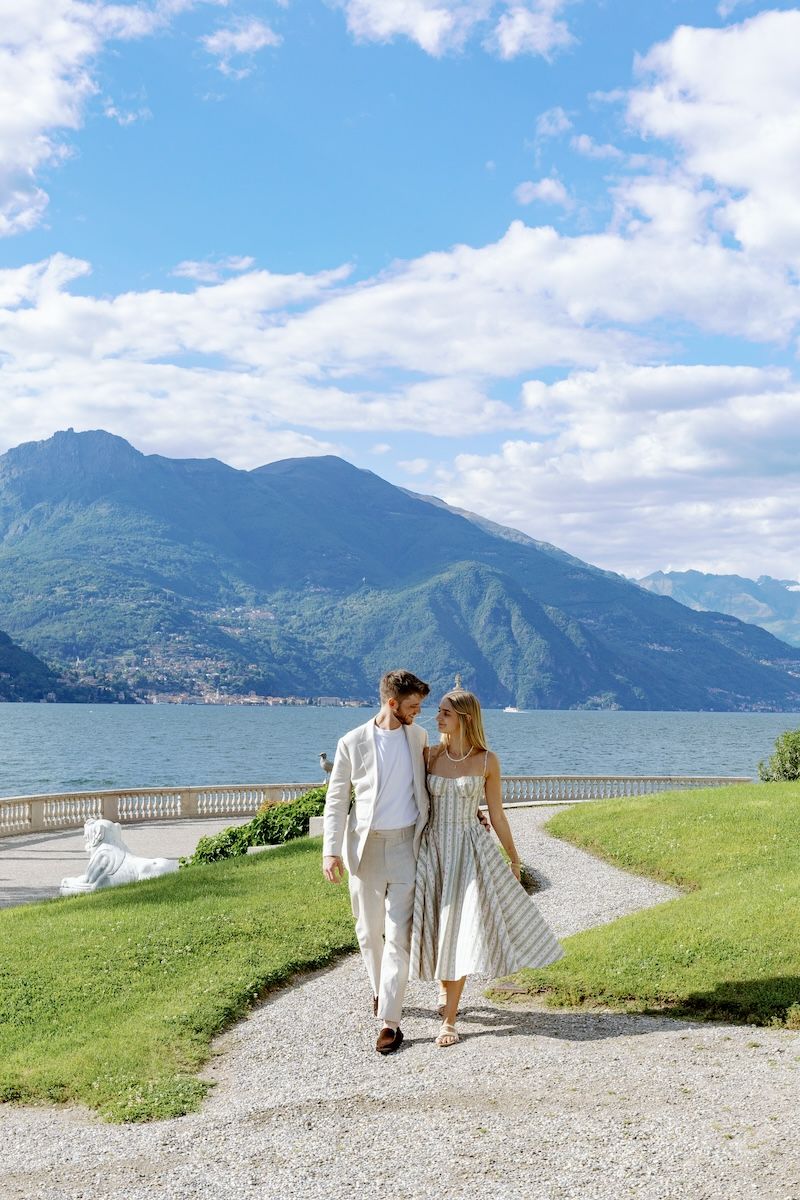engagement at lake como, italy, couple holding hands