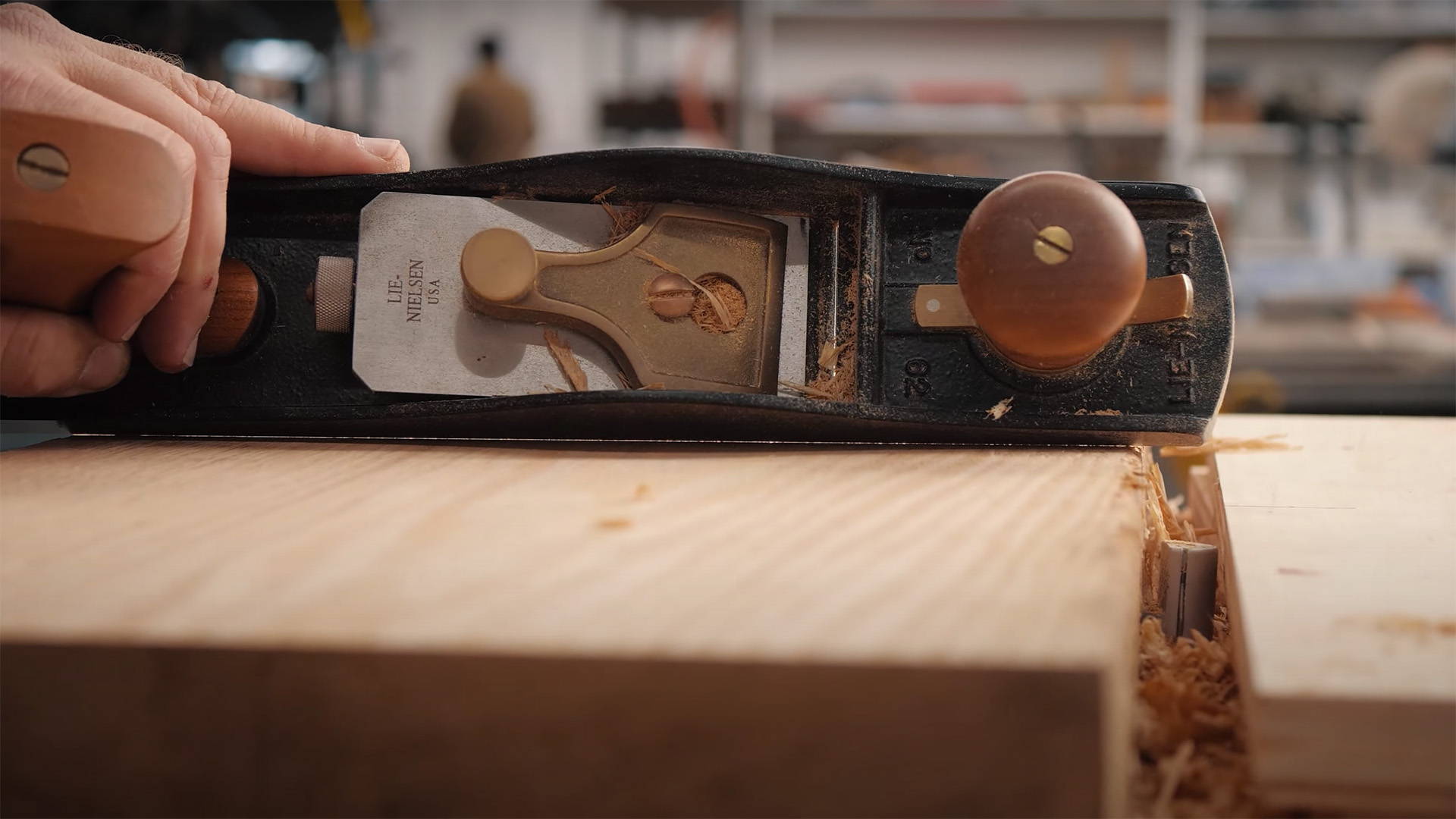 testing the flatness of a board with a hand plane