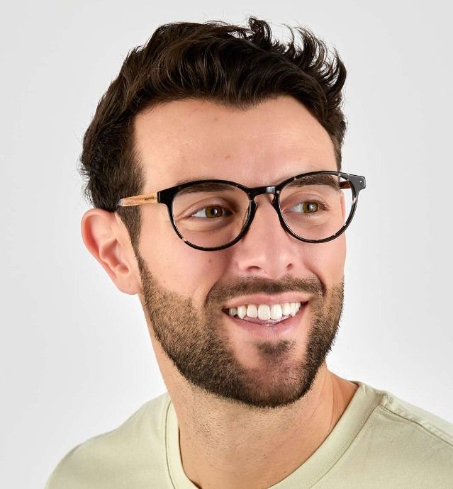 man with square face shape wearing Hope Black oval frame glasses on a white background