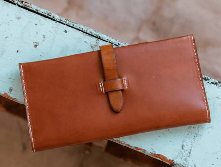 Brown Leather Wallet with Strap Closure