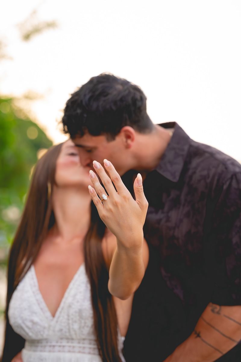 engaged couple kissing, candlewood lake, ct