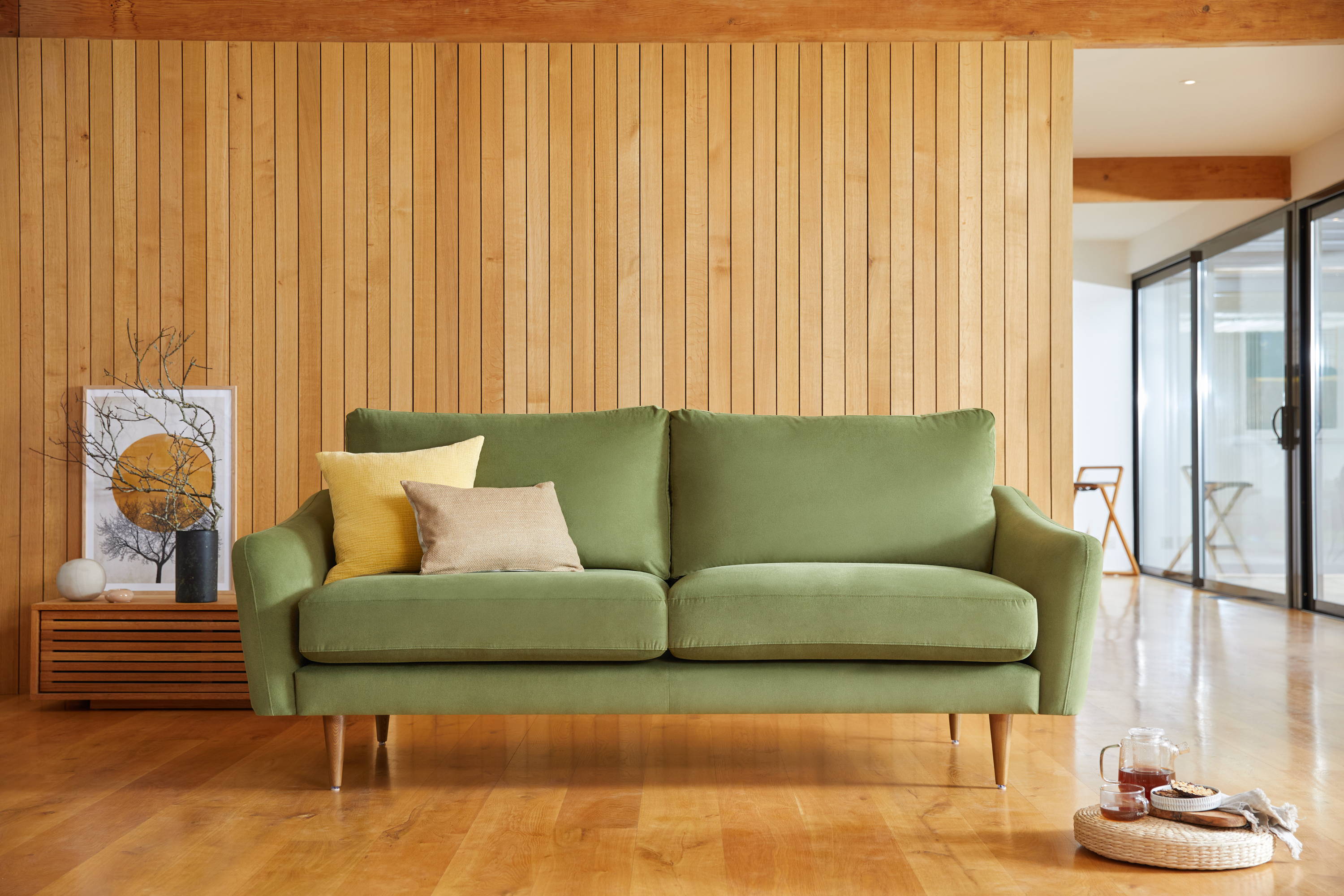 Stylish olive green sofa