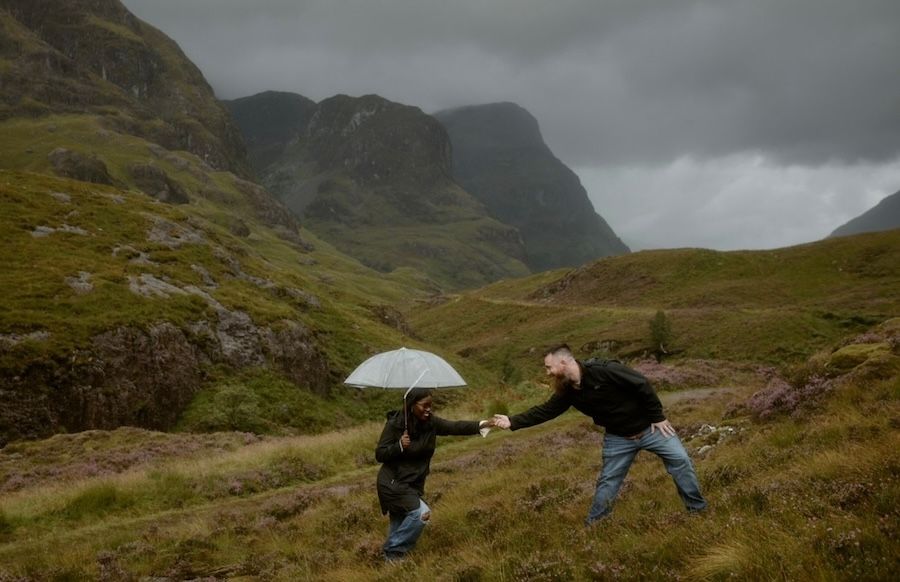 couple getting engaged in scottish highlands