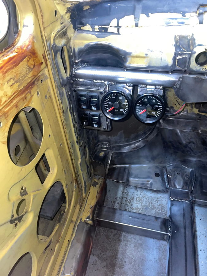 Interior metal dash fabrication with dual gauges and rocker switches on Remington's 1982 Volkswagen Rabbit Slam gallery photo 2