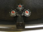 Top-down trunk view of three-horn mount panel on Lauren's white Volkswagen Jetta Rhino 3 Liter horn kit gallery photo 4