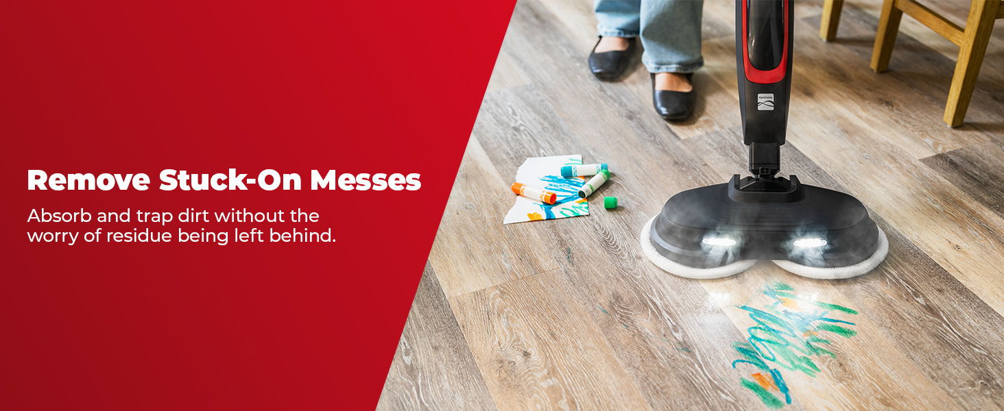 A steam mop cleans marker on a hardwood floor. Text about removing stuck-on messes.