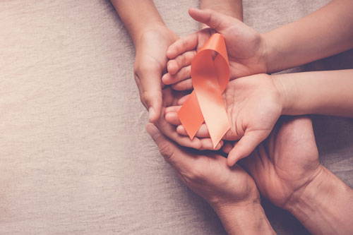 hands holding multiple sclerosis ribbon