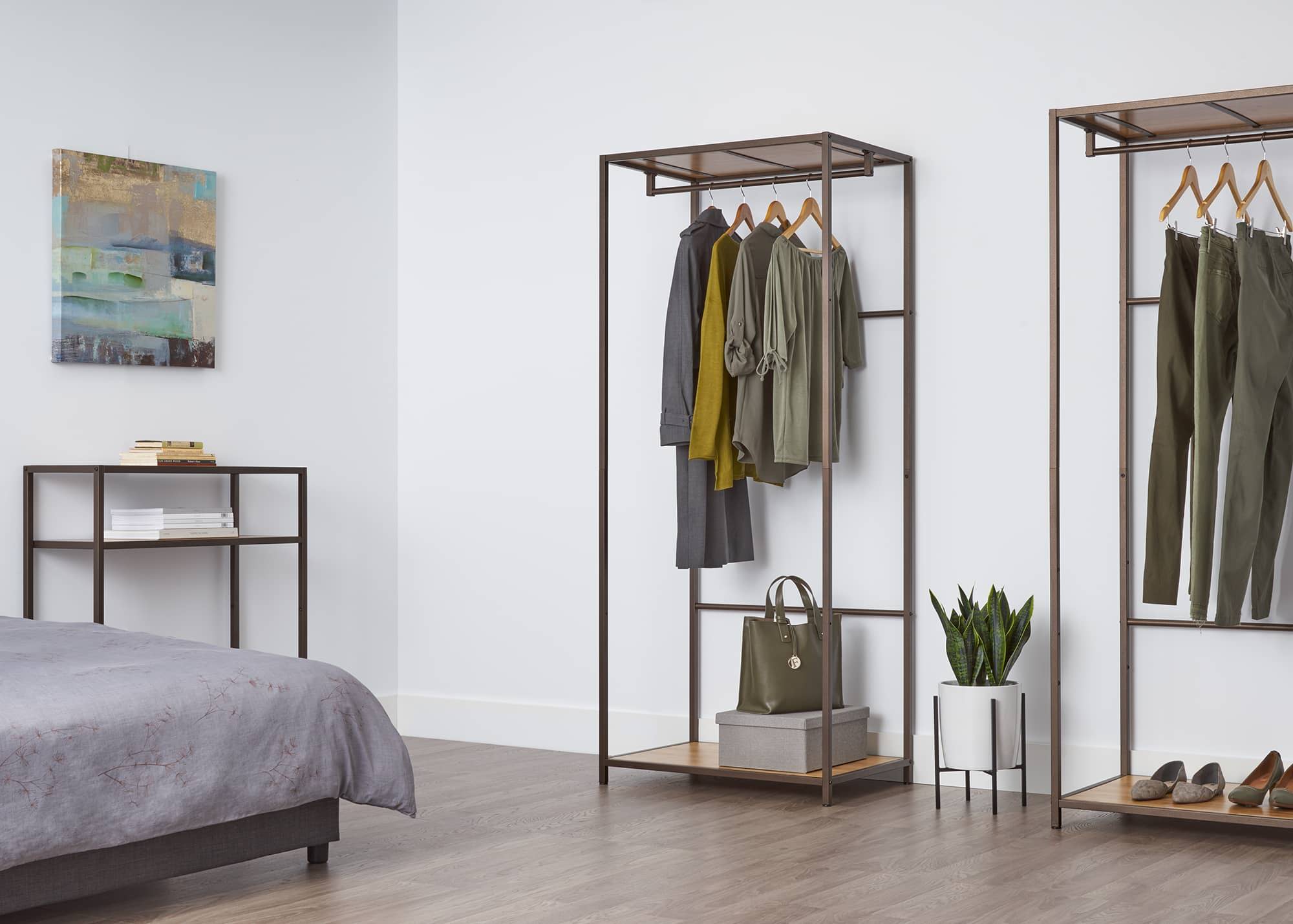 garment rack with 2 shelves, in an apartment bedroom