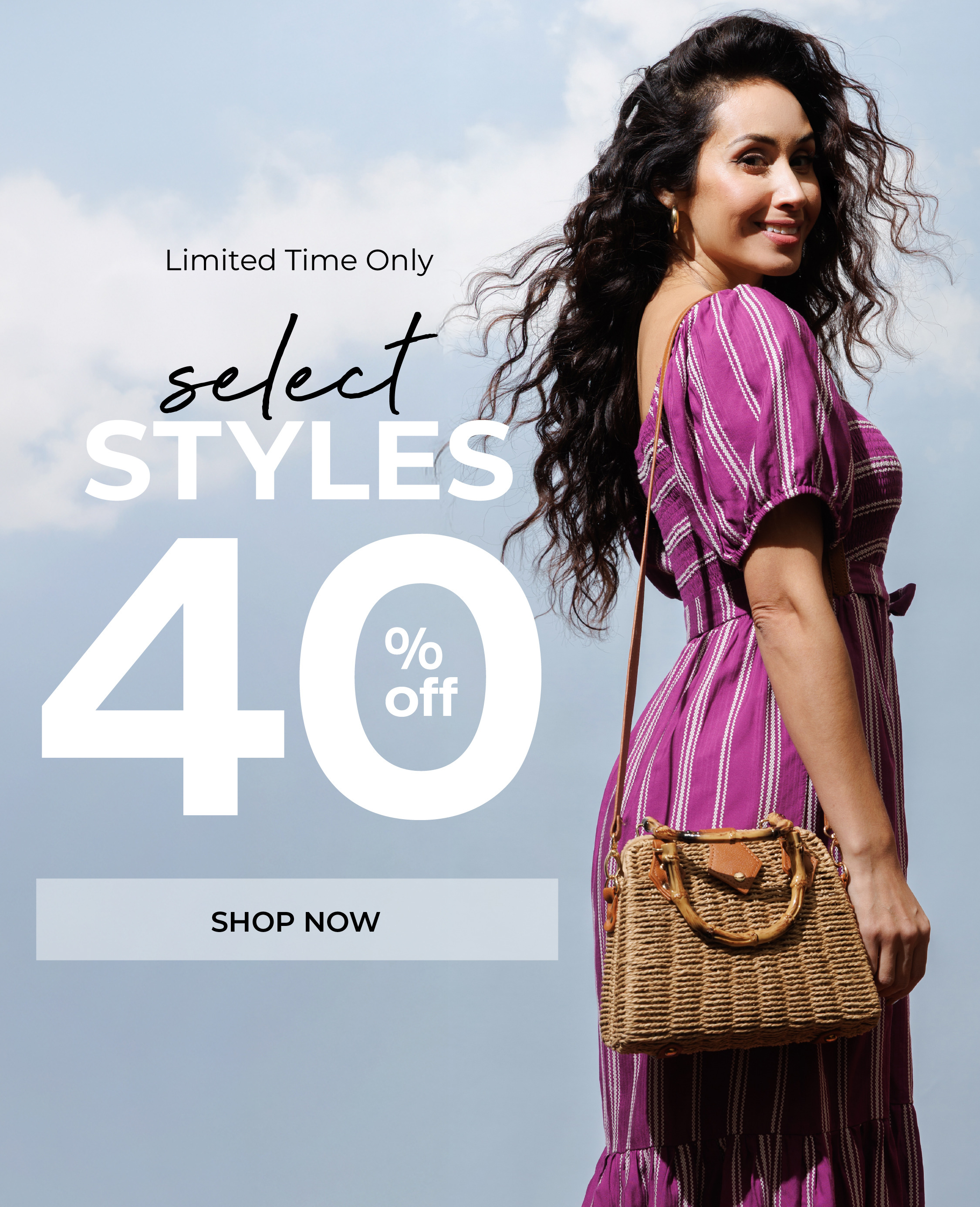 Woman in a purple dress promoting 40% off select styles. Shop now.