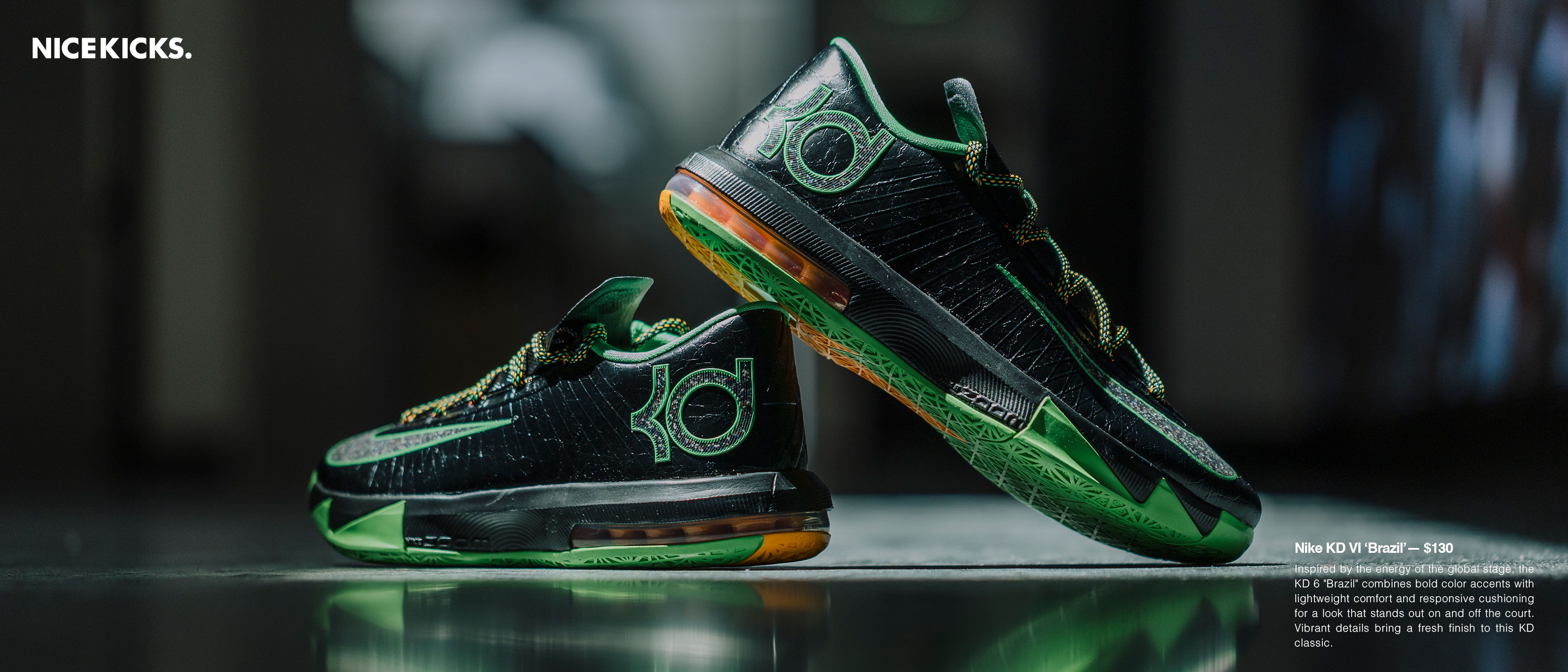 Nike sneakers with green and black design, positioned dynamically on a surface.
