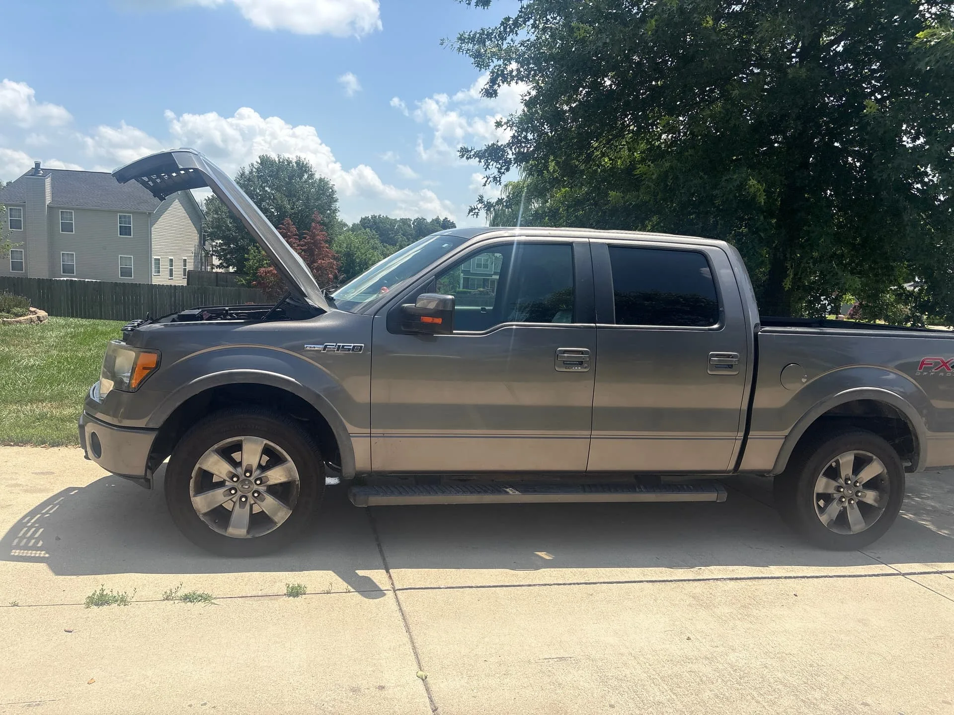 Courtney's 2013 Ford F-150 with 4-Chime Air Horn Kit train horn install exterior photo 1