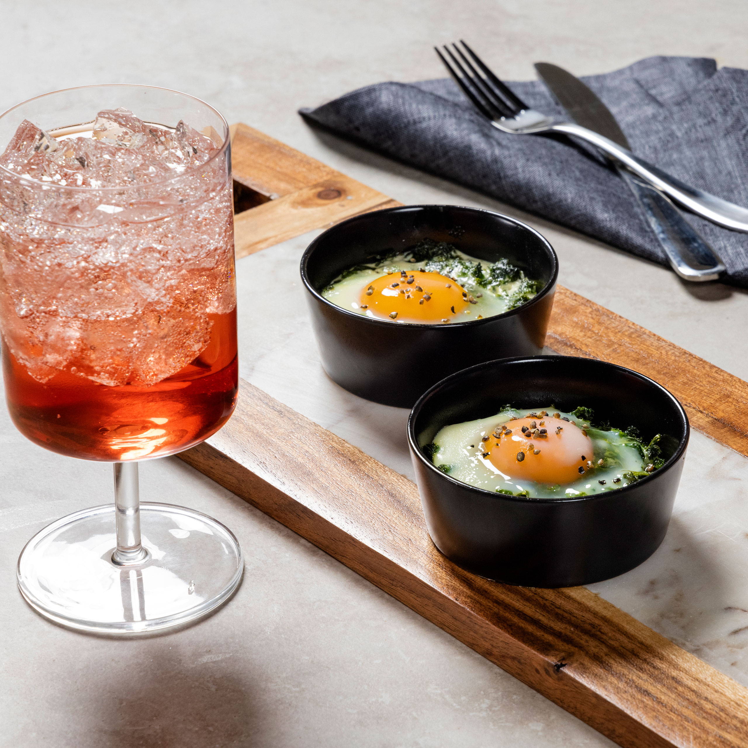 Baled eggs with garlicky greens 