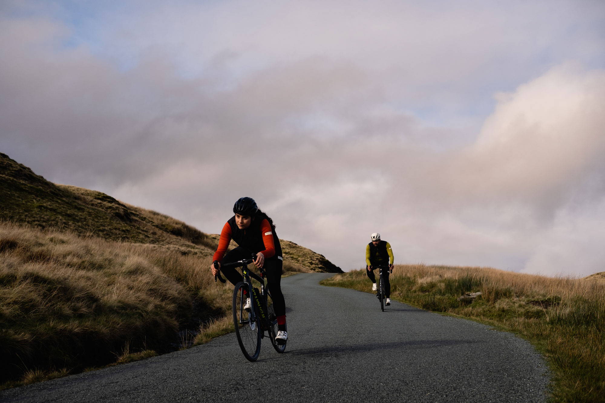 Two cyclists riding in Wales