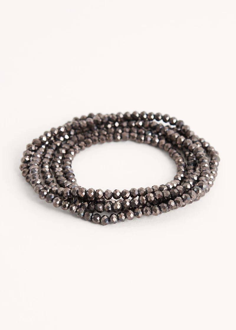 A necklace comprised of small gunmetal coloured faceted sparkly crystal beads