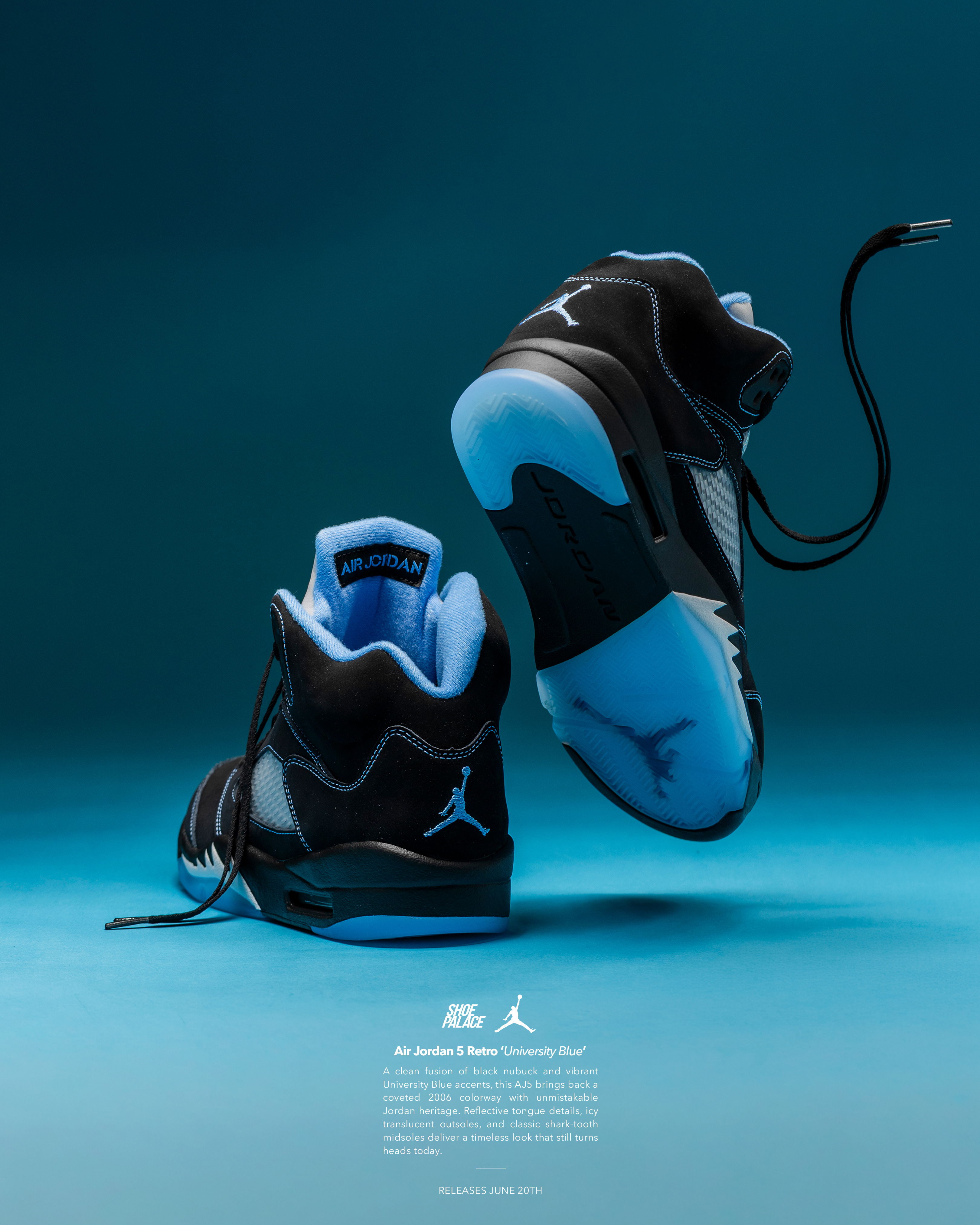 Black and blue athletic shoes on a blue background.