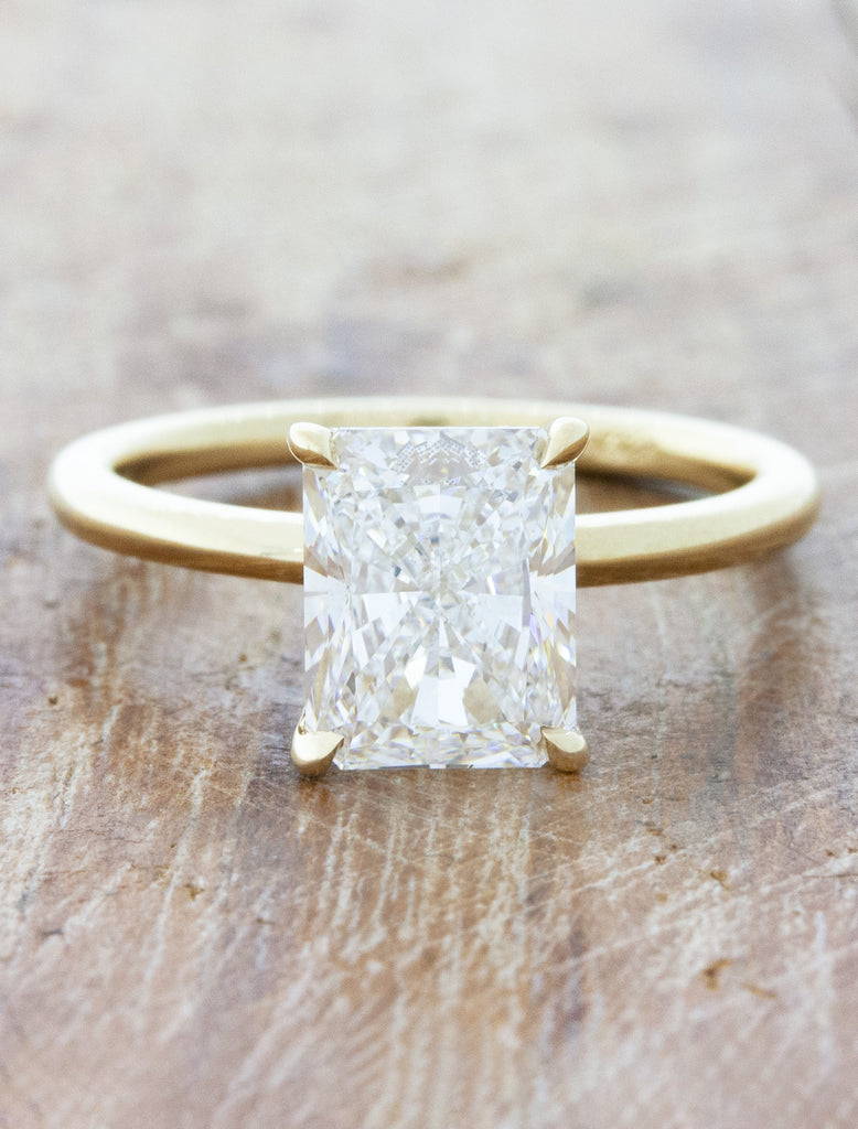 radiant cut diamond ring in yellow gold