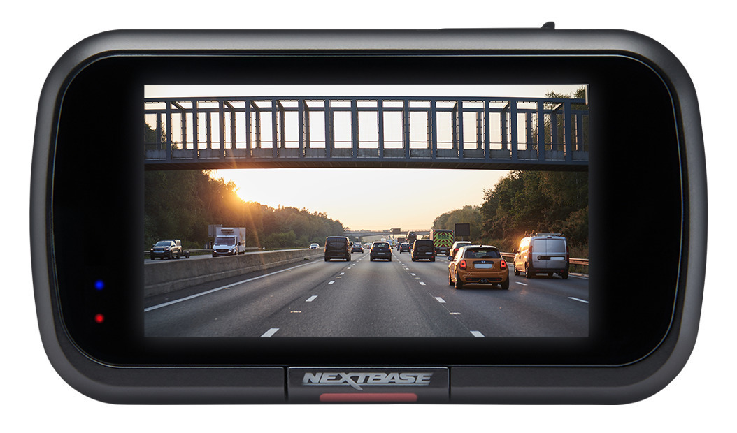 Nextbase dash cam displaying highway traffic under an overpass.