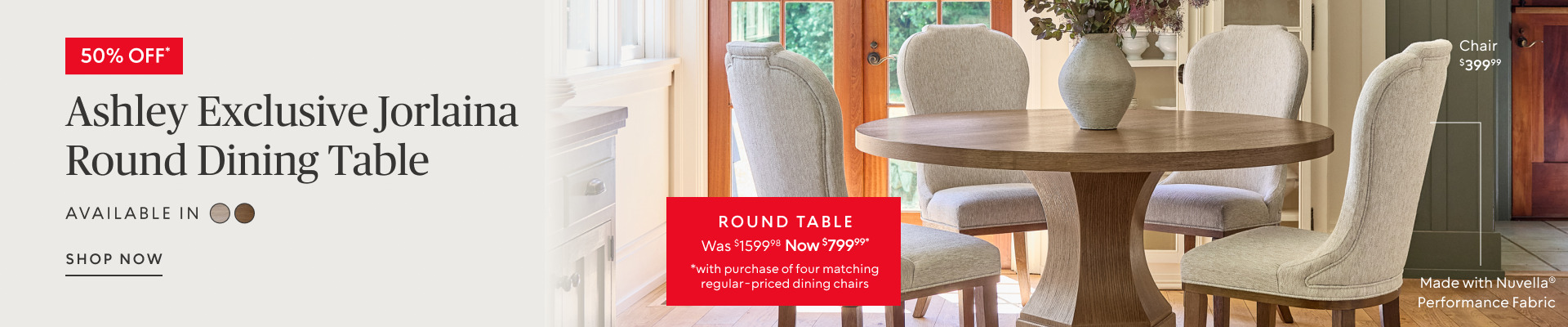 50% off Ashley Exclusive Jorlaina Round Dining Table was $1599.98 now $799.99 when you buy four matching regular price chairs