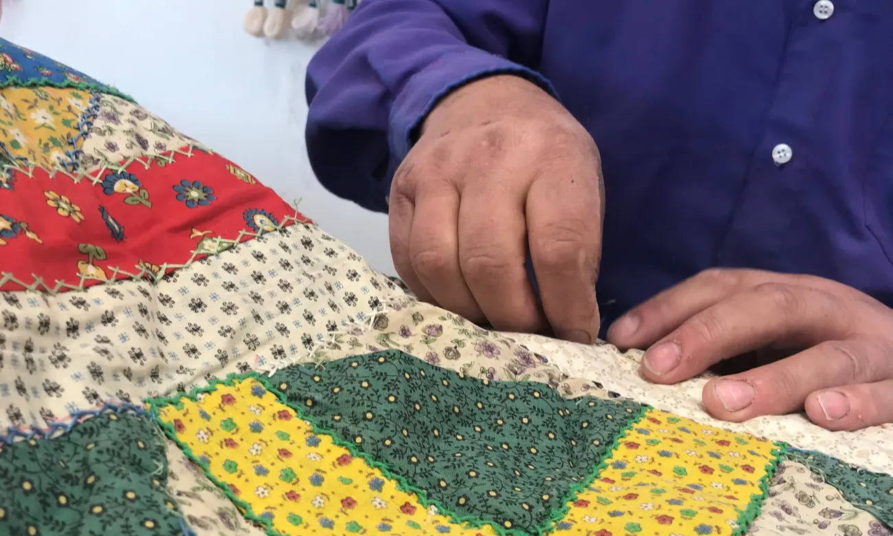 teaching prisoners to sew