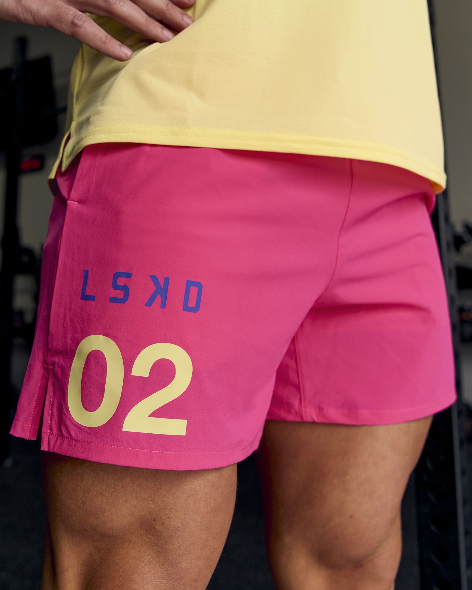 Person wearing pink shorts with 