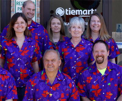 Photo of the TieMart family wearing Hawaiian shirts