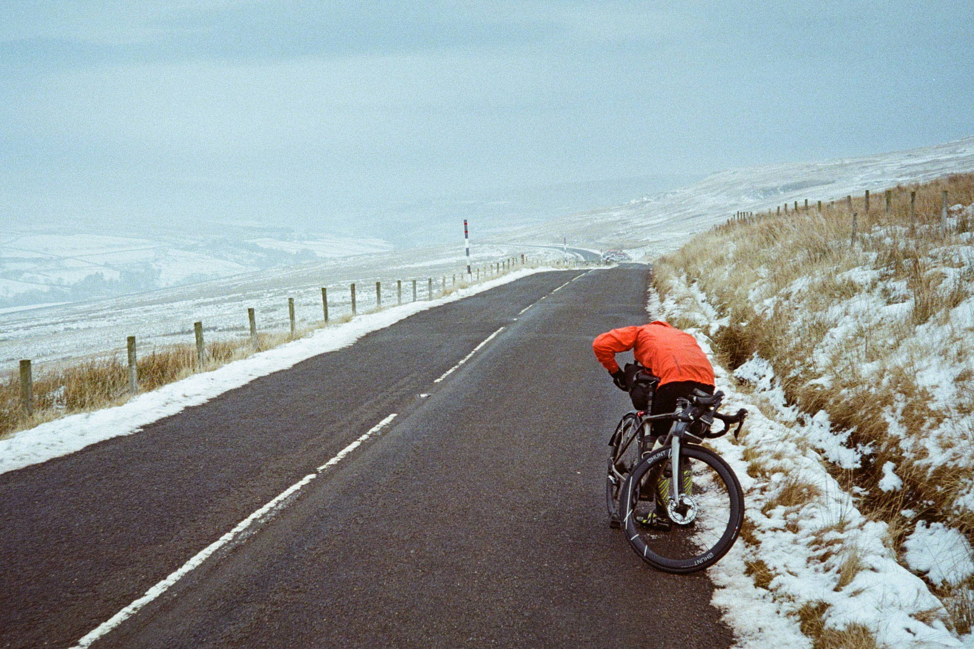 Rider by the side of the road in the snow, 48 Limitless wheels