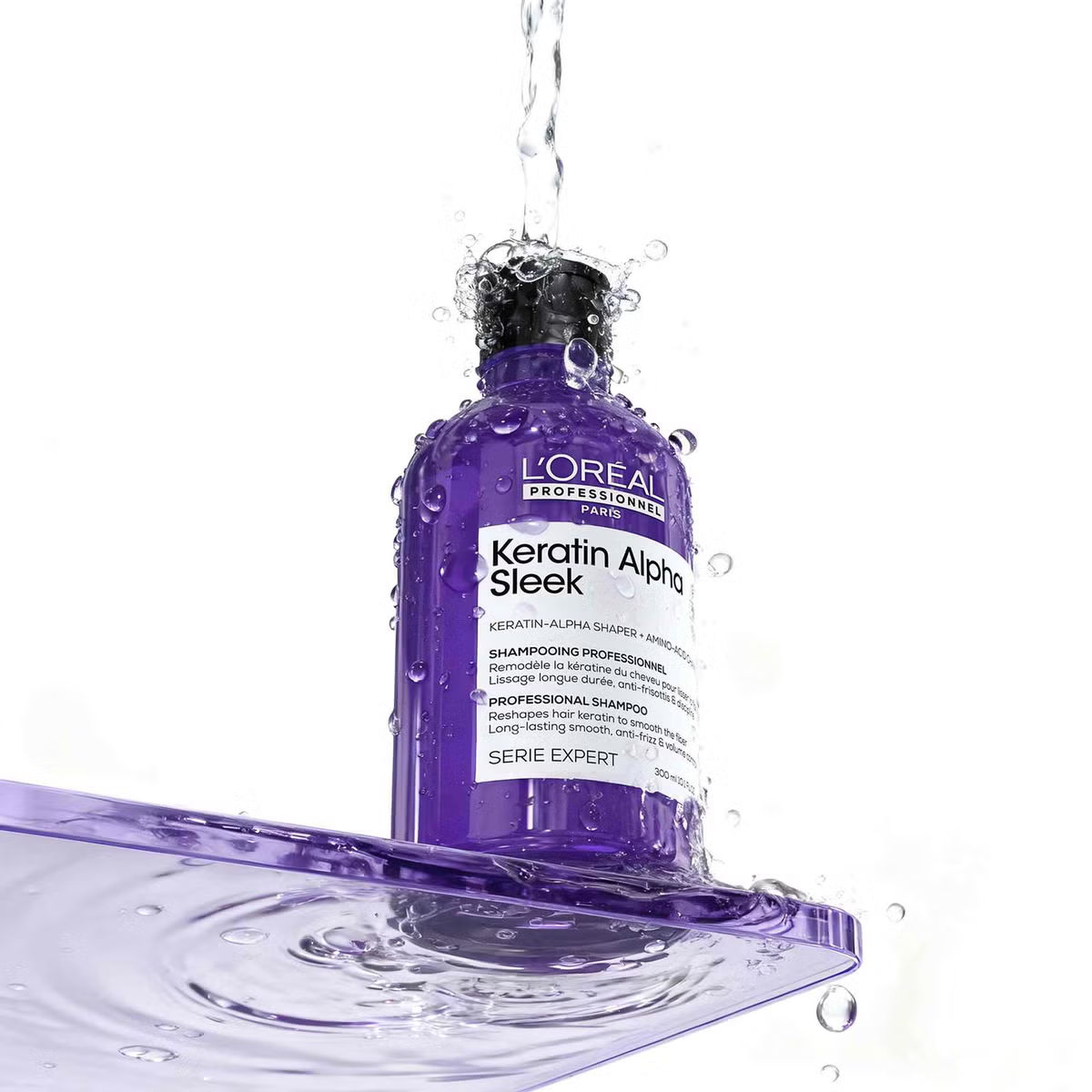 Purple shampoo bottle splashing in water, with label visible.