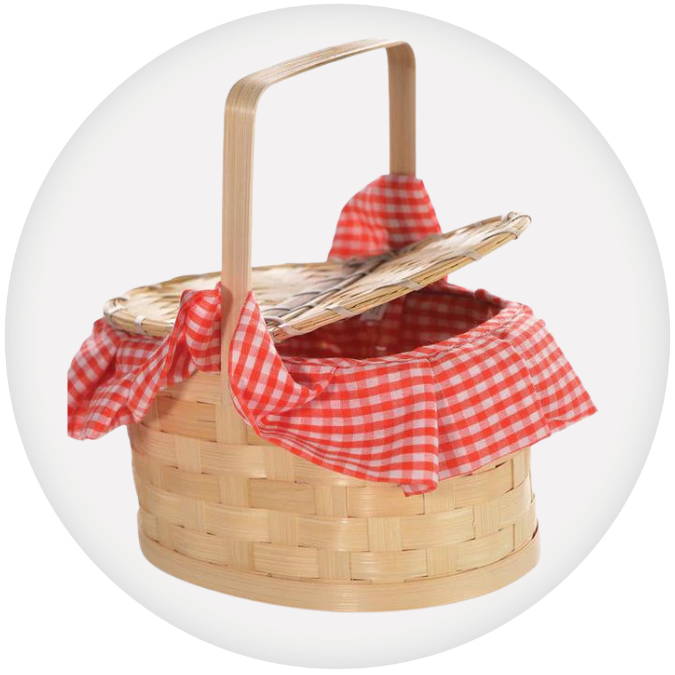 Woven fairytale baswket with red gingham lining. Shop all baskets and bags.