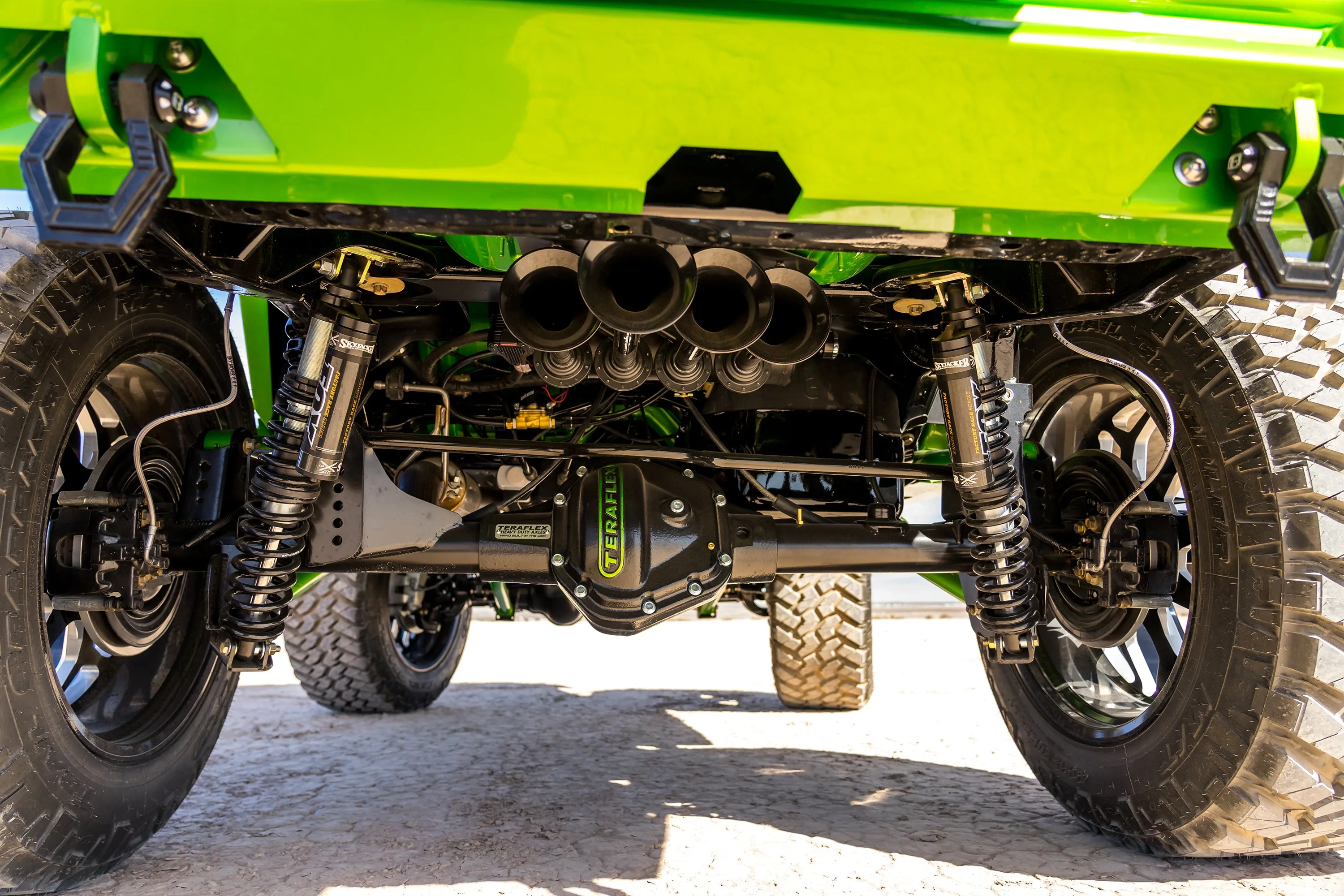 Close-up mounting bracket brass fittings plumbing onboard air Cambered Customs Wrangler JK Conductor's Special 244 Nightmare Edition train horn install detail photo 4