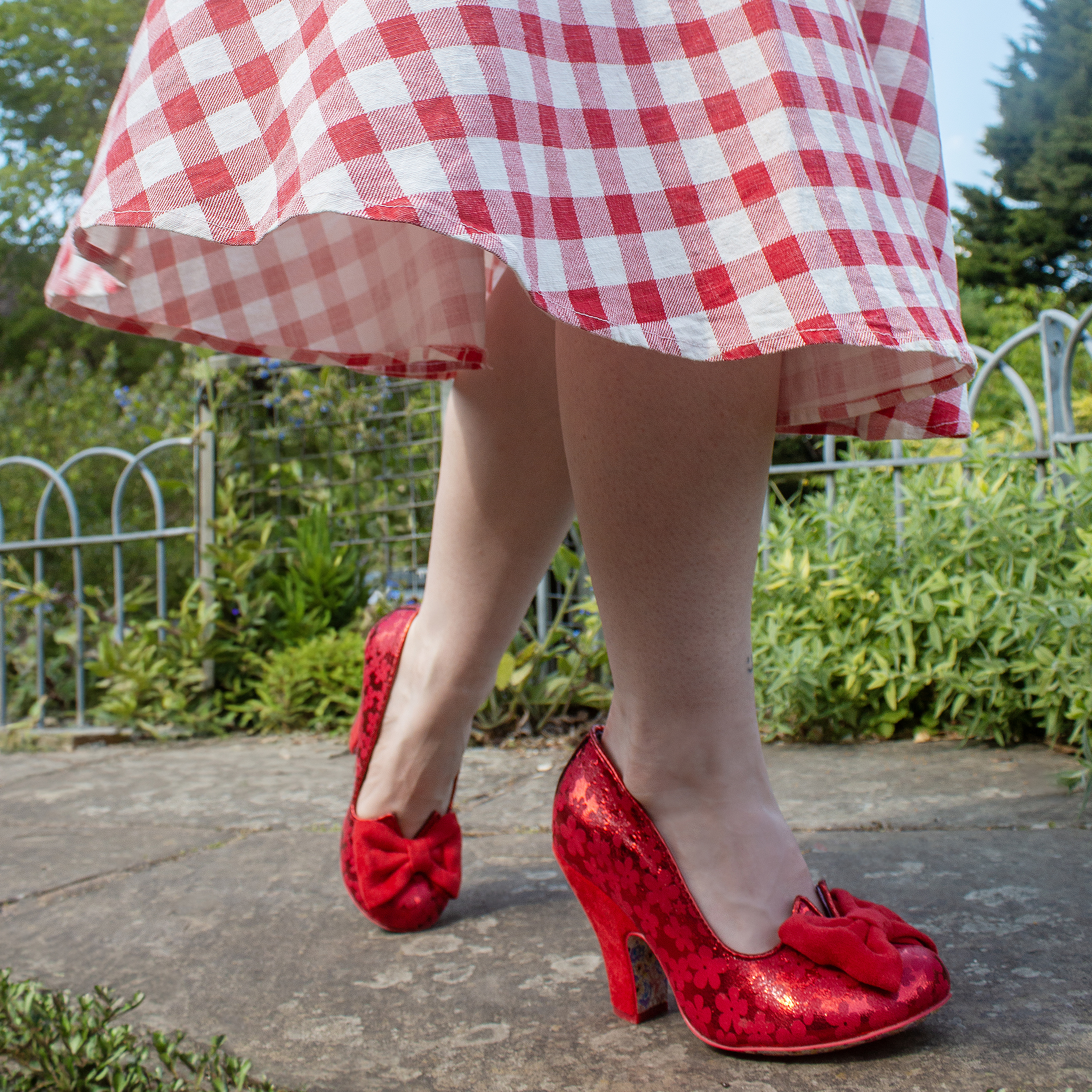 Red elegant high block heeled shoes with a shiny floral finish