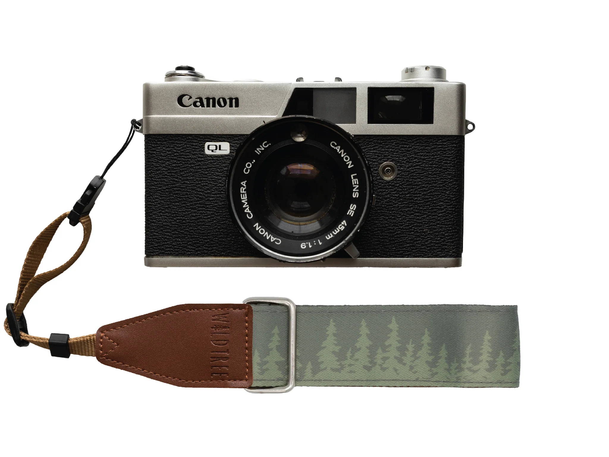 Cannon camera with a pine tree wrist camera strap design. 