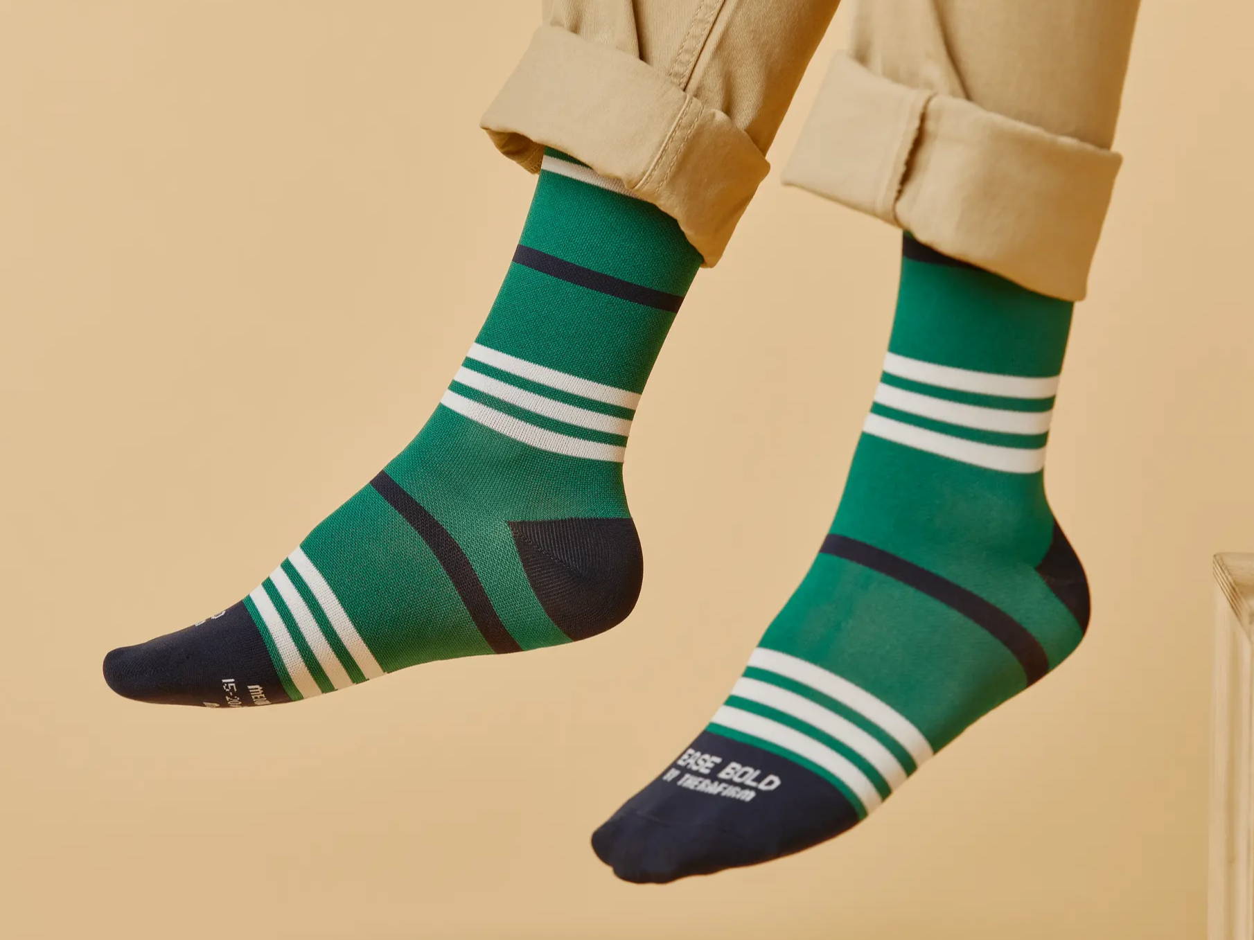 Male wearing Ease Gradient Compression Socks in Evergreen