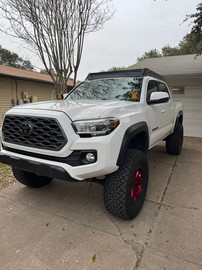 Front three-quarter white Tacoma TRD Off-Road lifted red wheels Prinsu rack overcast driveway Joel's 2-Chime 3-Liter gallery photo 5