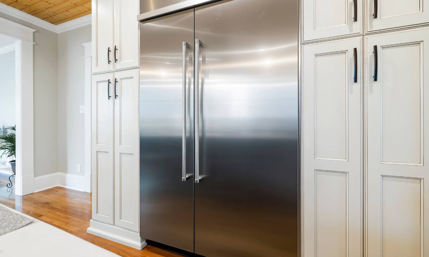 a large stainless steel refrigerator in a kitchen