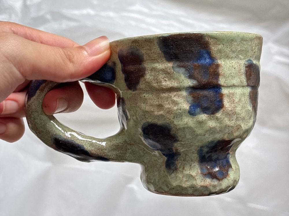 ceramic cup in grey and dark blue