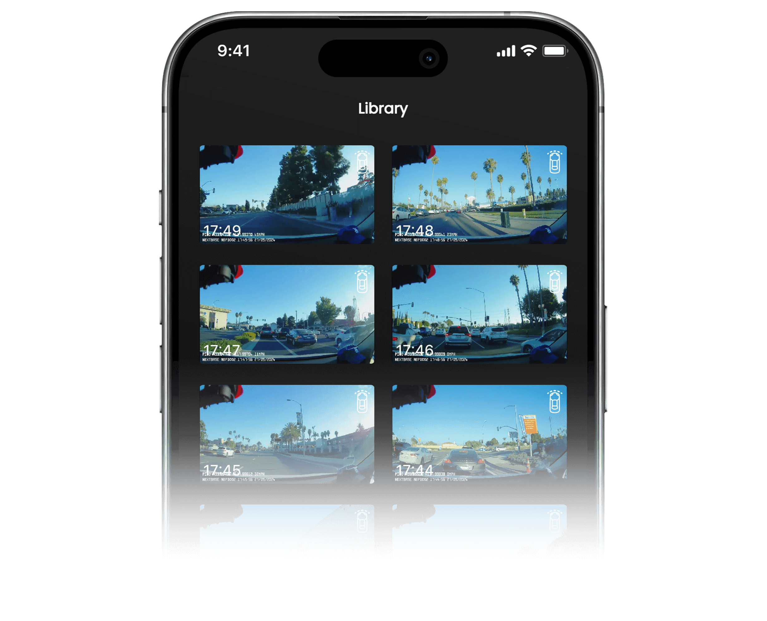 Image of a smartphone displaying a photo library grid.