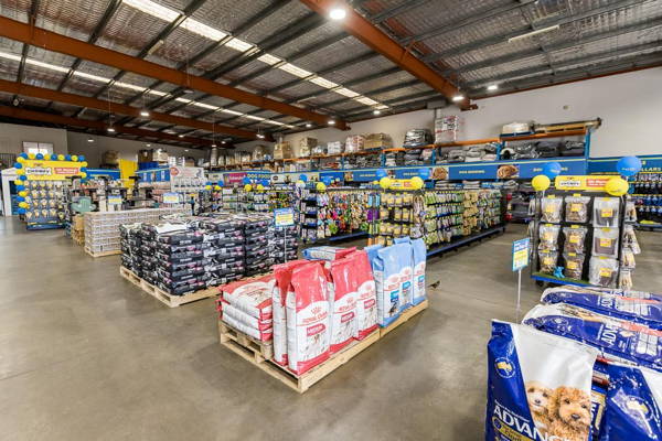 Inside a PetO pet store in Beverly Hills, Sydney showing dog food stacked on pallets