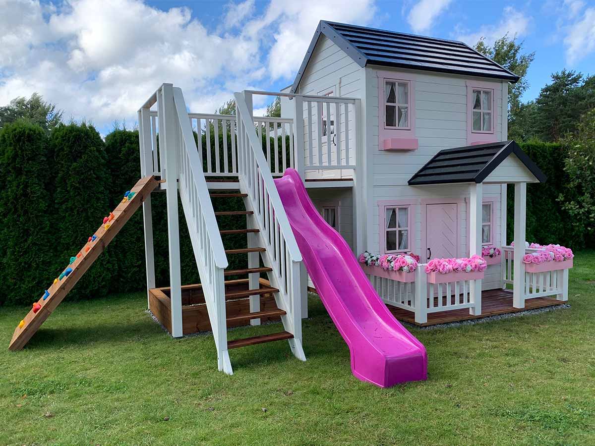 Decorated 2storey Wooden Outdoor Playhouse with climbing wall, sand box and slide by WholeWoodPlayhouses