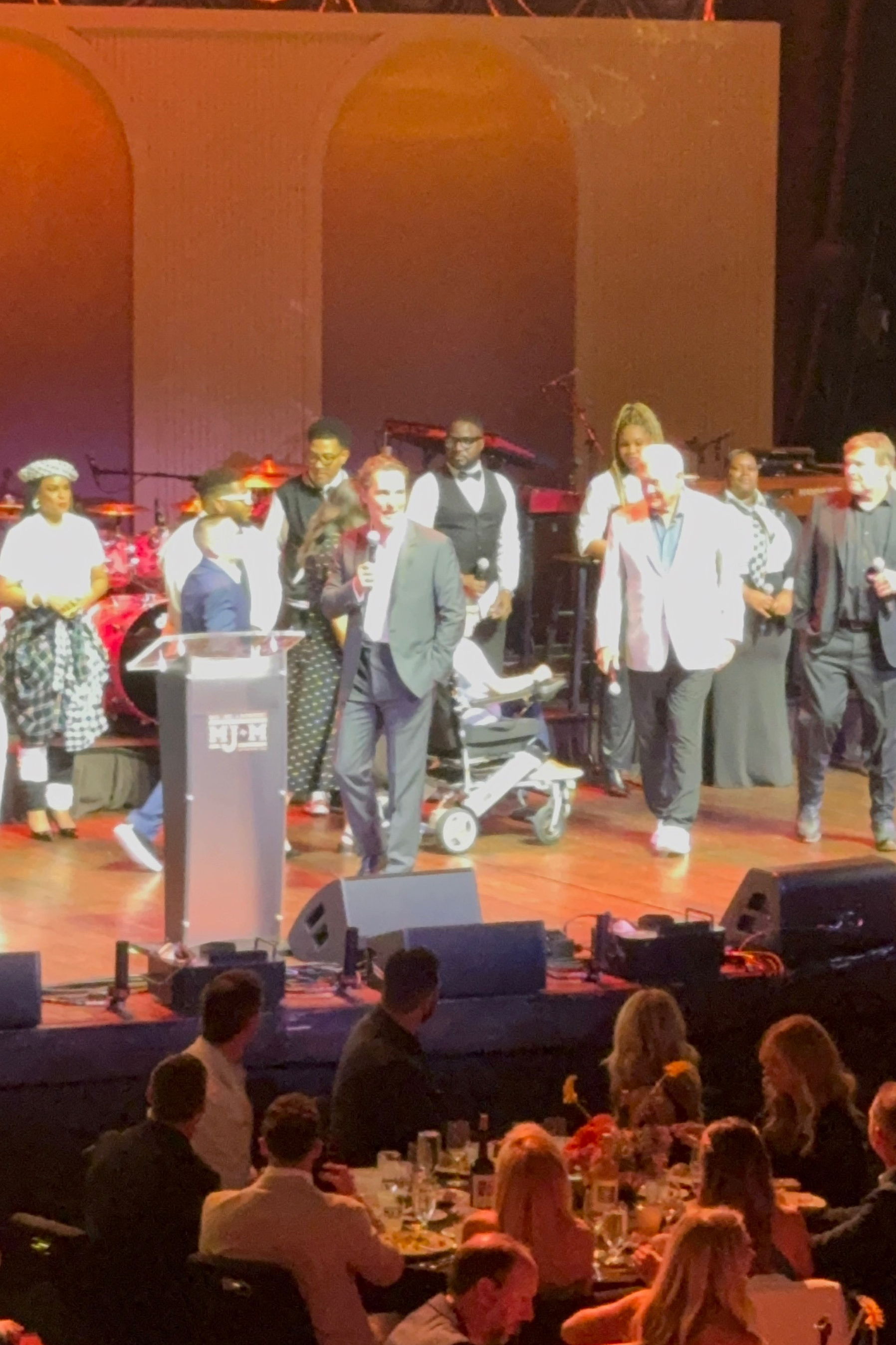 Matthew McConaughey on stage helping with fundraising efforts at the 2026 MJ&M Fundraiser