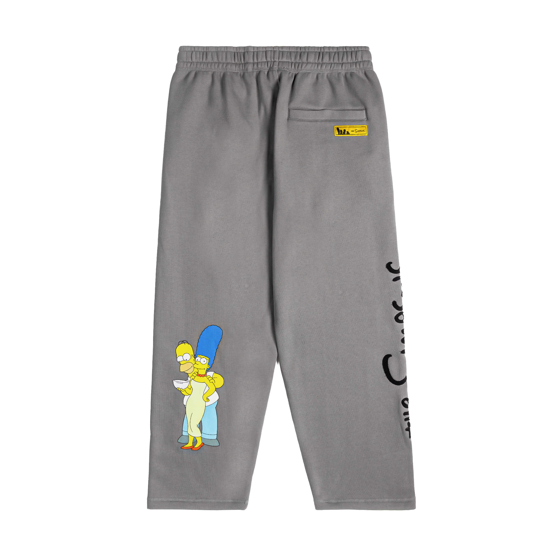 Gray sweatpants featuring cartoon character and logo design.