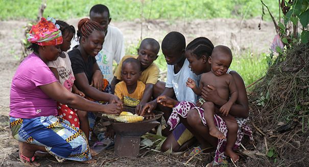 A family sharing food in West Africa