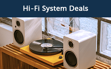 Hi-Fi system with speakers and a vinyl record player on a wooden table.