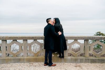 engaged couple kissing, sands point, long island