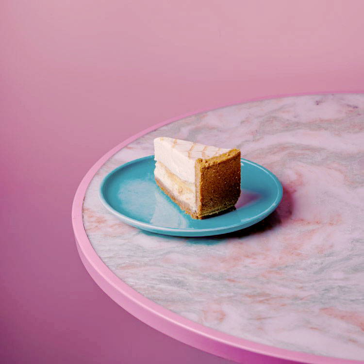 Caramel Dulche Cheesecake on a marble table
