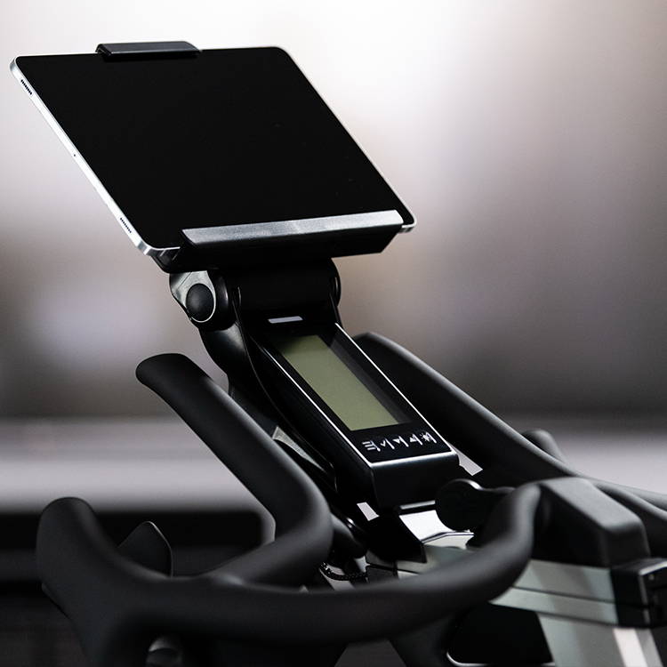Bring Your Own Device holder with table on Ride CX Indoor Cycle