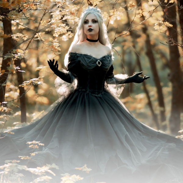 Simplicity editorial: black gown in an autumn forest
