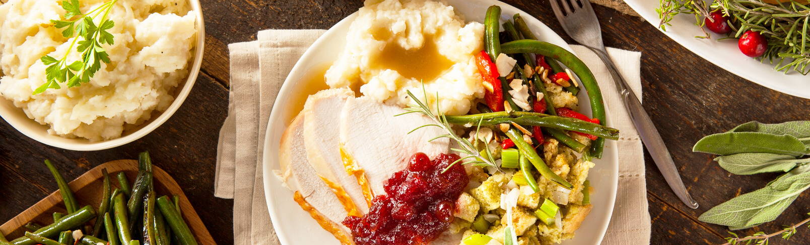 High Quality Organics Express turkey dinner with mashed potatoes and gravy, with stuffing, and cranberry sauce